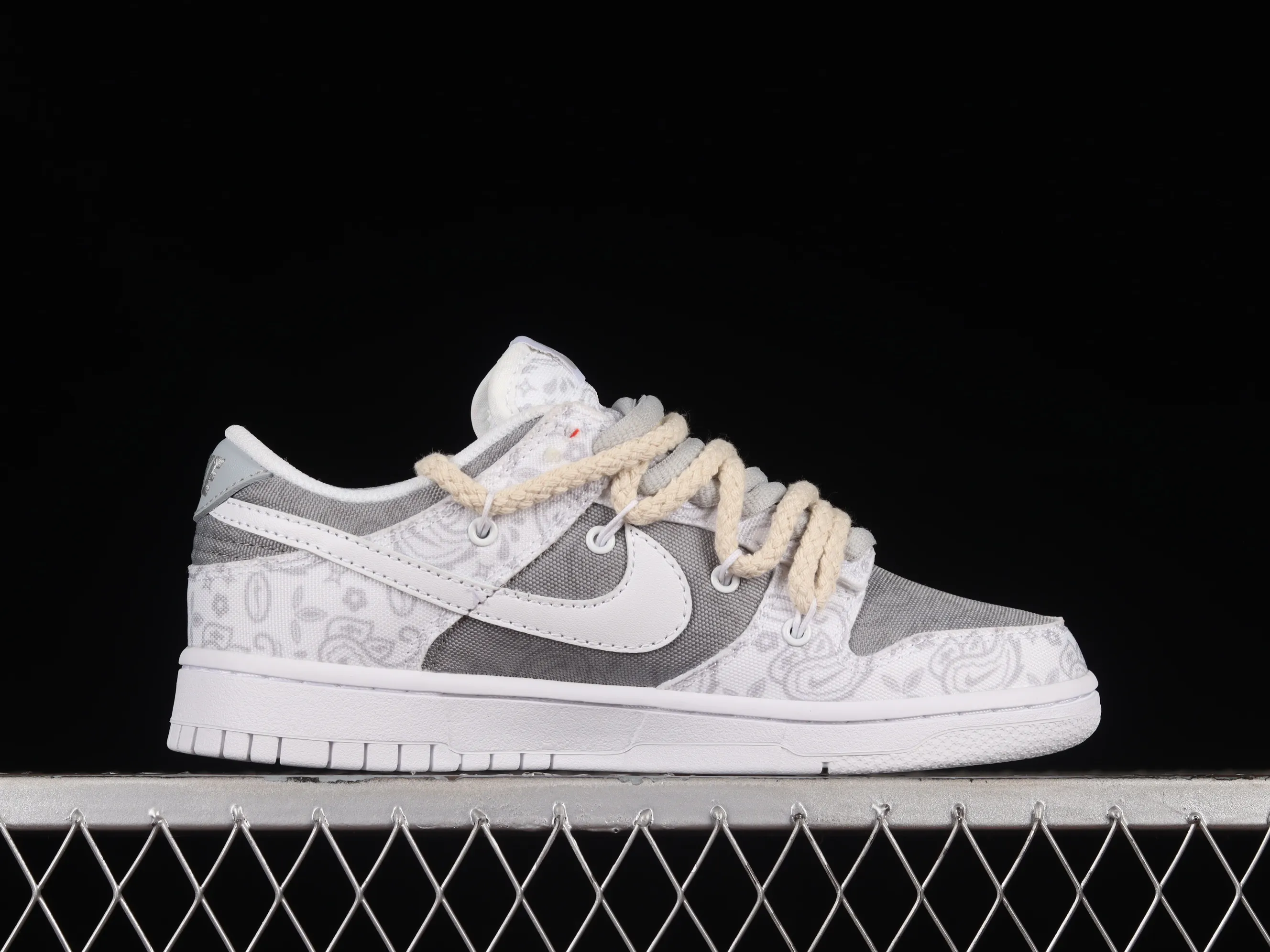 All categories Nk SB Dunk series Nk SB Dunk Low low-top sneakers Nk Dunk Low ESS reverse cashew flower customized version of deconstructed strap casual sneakers DJ9955-100